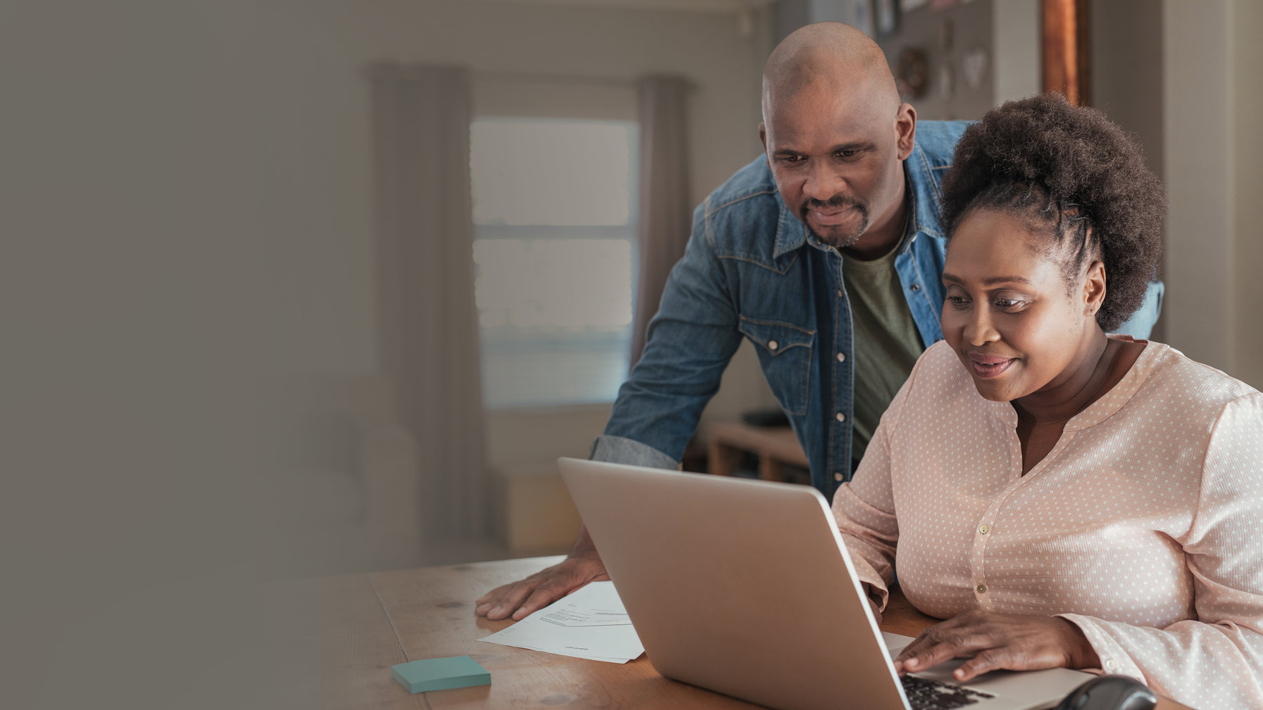 Family looking at computer