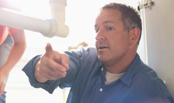 A contractor working in a home