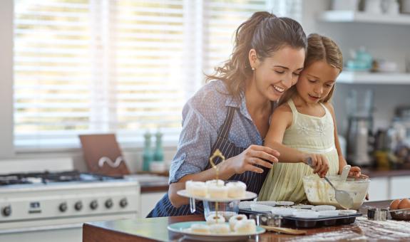 Mom and daughter baking