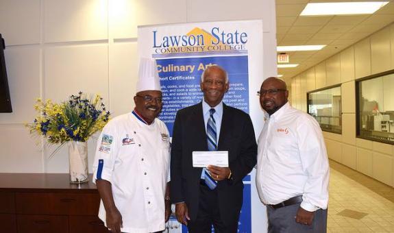 Image of: Rebate check presentation with chefs