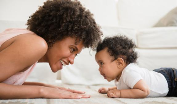 Image of mother and baby looking at each other