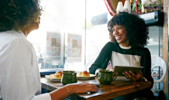 Image of small business owner at her restaurant