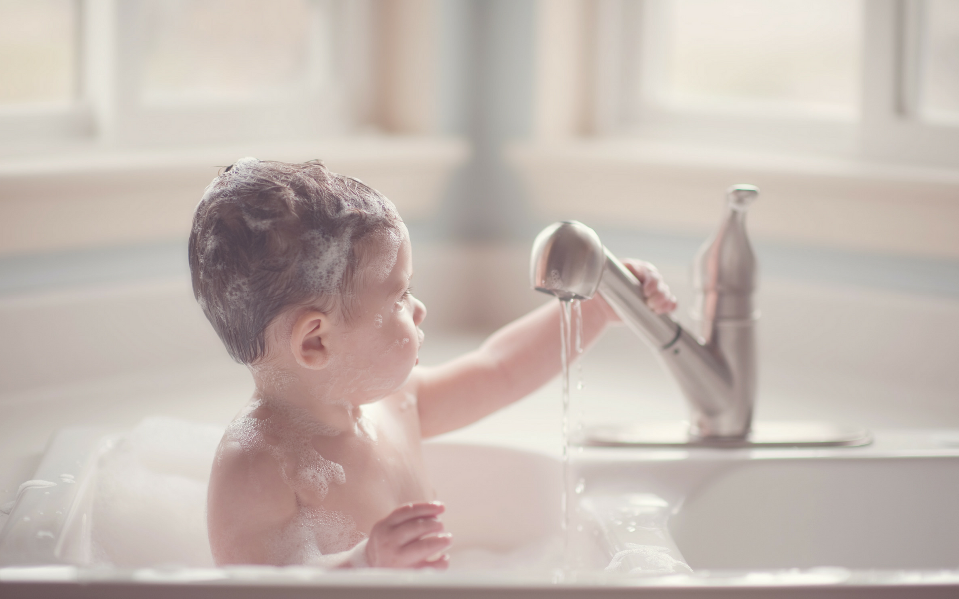 Baby taking bath