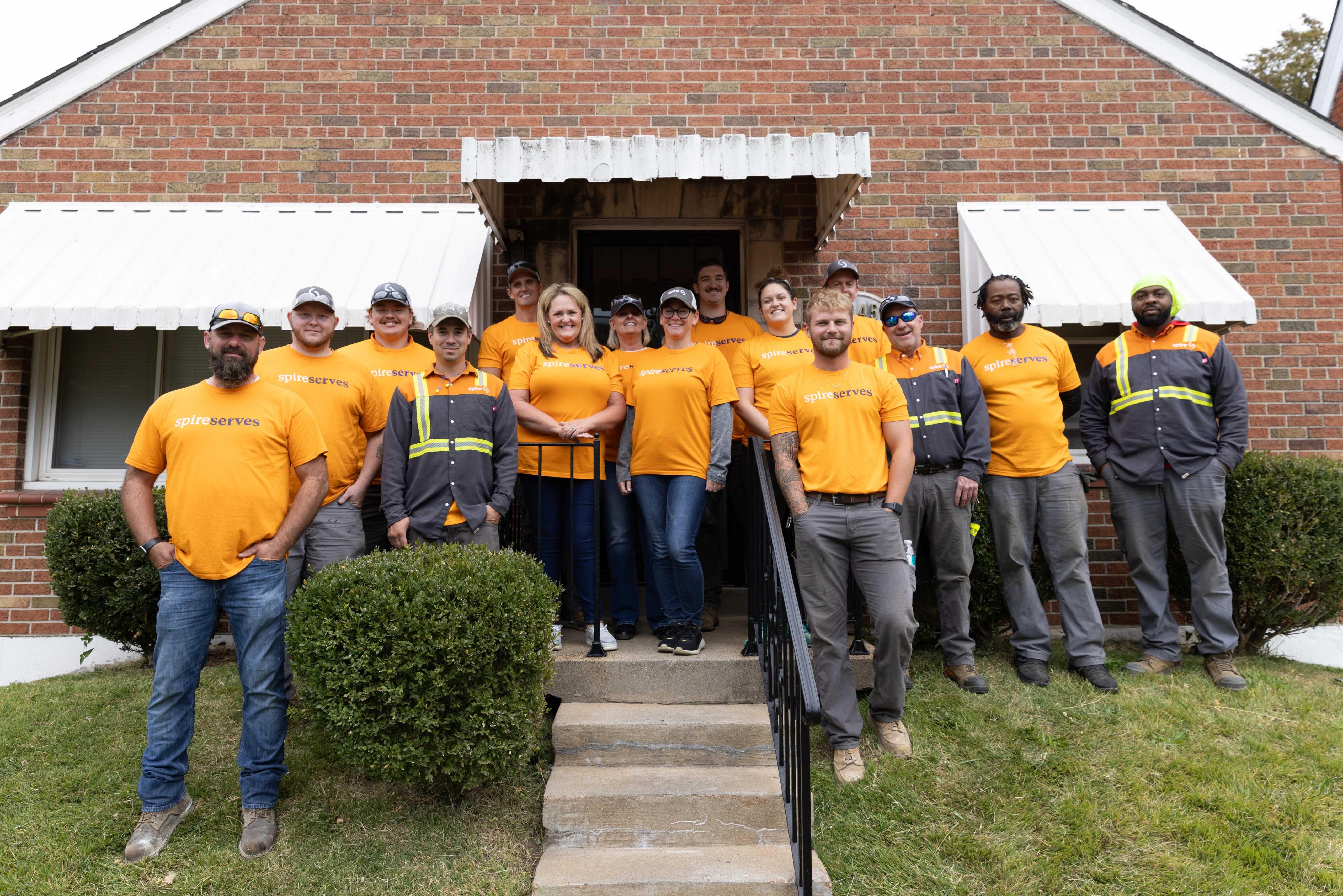 Image of Spire employees at a rebuilding together site