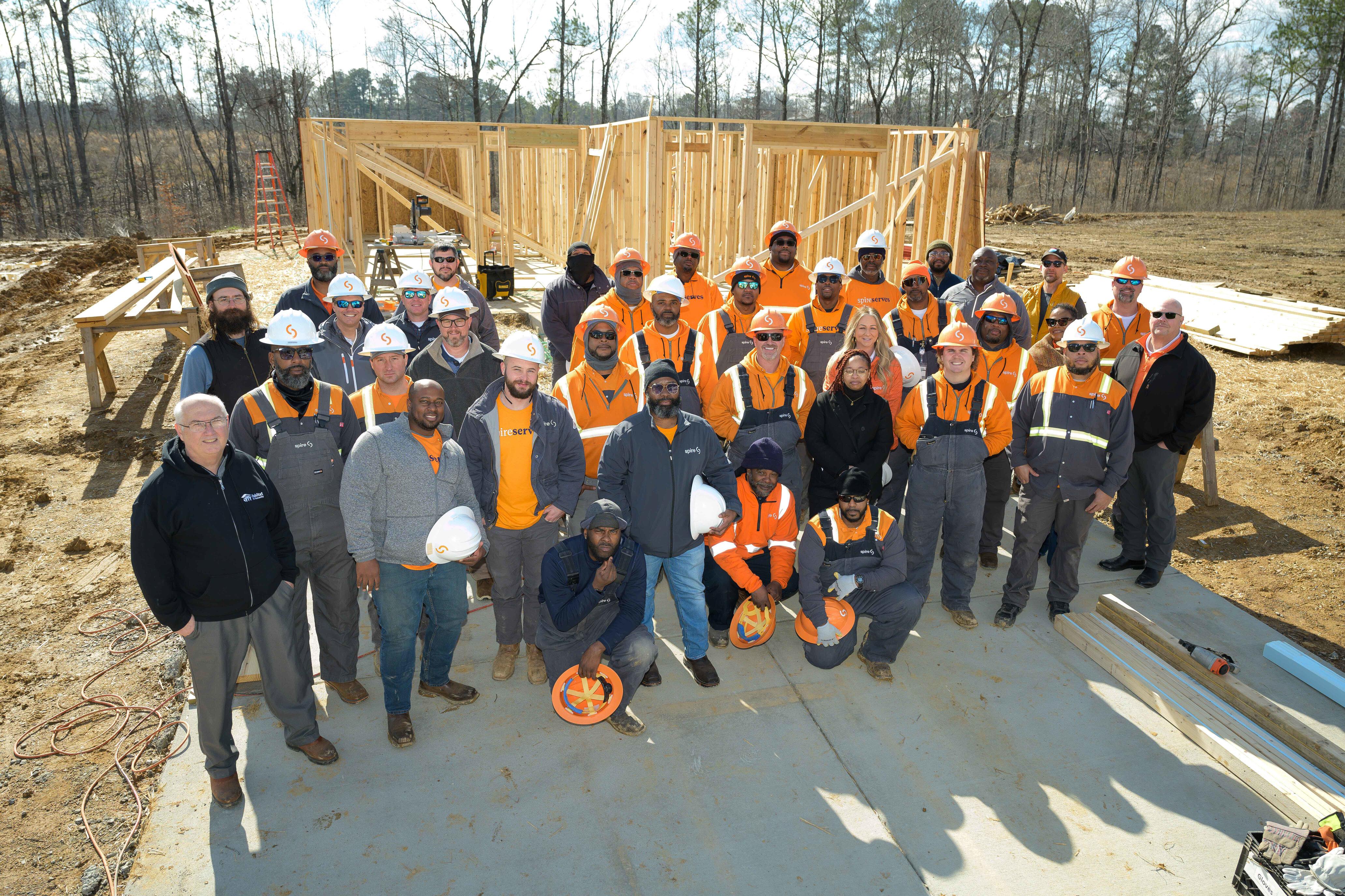 Image of Spire employees at a Habitat for Humanity building site in Bessemer, Alabama