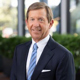 Image of spire board member Paul D. Koonce. He is looking at the camera and smiling